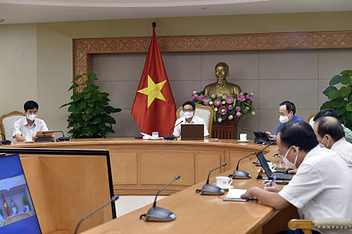 Phó Thủtướng Vũ Đức Đam tham dự trực tuyến tại Trụ sở Chính phủ - Ảnh: VGP/Đình Nam